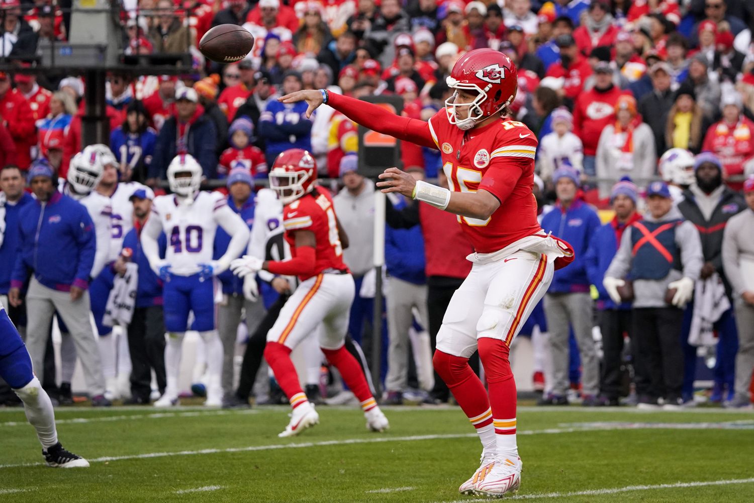 Dec 10, 2023; Kansas City, Missouri, USA; Kansas City Chiefs quarterback Patrick Mahomes (15) throws a pass against the Buffalo Bills during the first half at GEHA Field at Arrowhead Stadium. Mandatory Credit: Denny Medley-USA TODAY Sports  